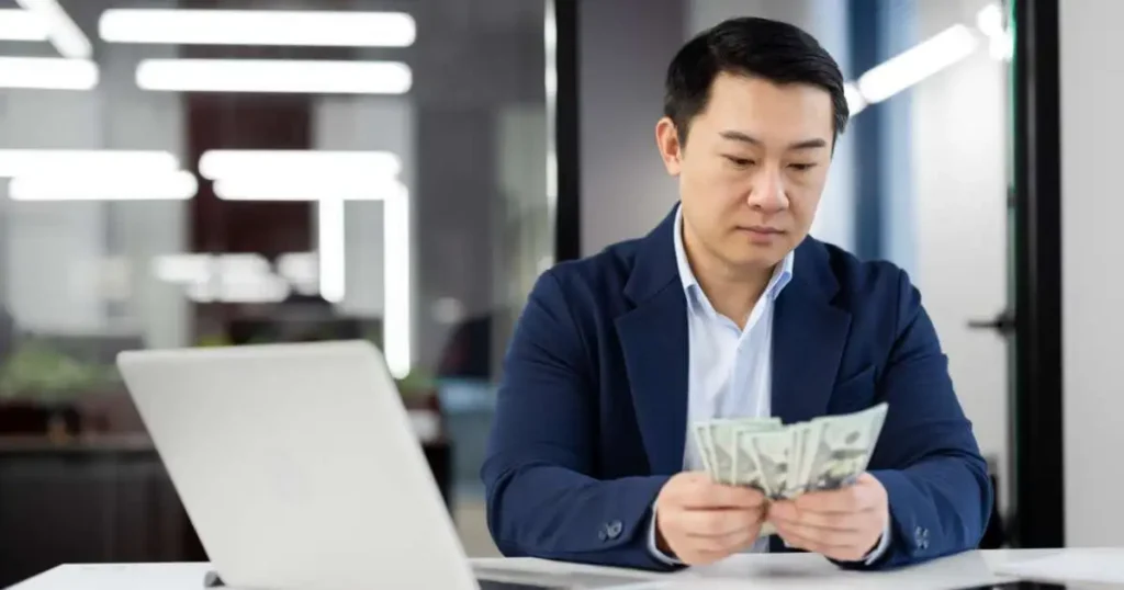 Man Looking at Tips to Get the Best Personal Loan Offer Tips to Get the Best Personal Loan Offer