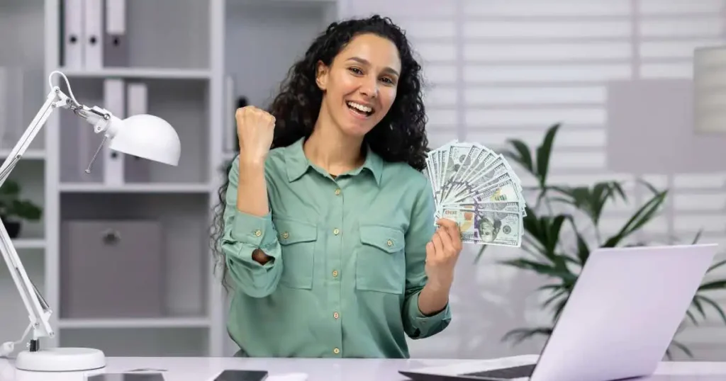 woman holding instant cash advance lenders with no hidden charges Why Beem's Everdraft™ Is the Top Choice Among Instant Cash Advance Lenders with No Hidden Charges